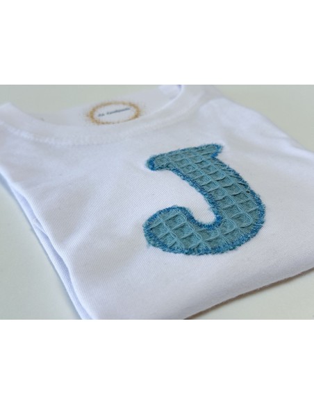 Cubrepañal con tirantes y camiseta